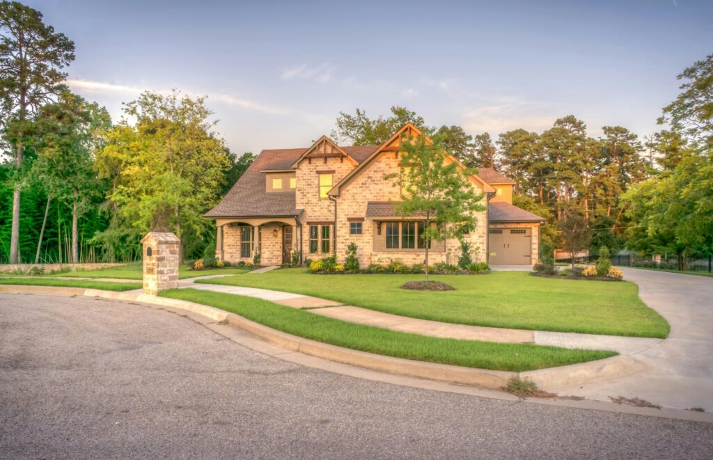 A residential home just outside of Cincinnati with healthy, beautiful trees in the summertime.