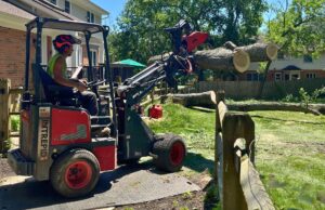 Lefke Tree Experts equipment operating on professional ground protection mats during Cincinnati tree removal, showing how proper lawn protection prevents property damage.