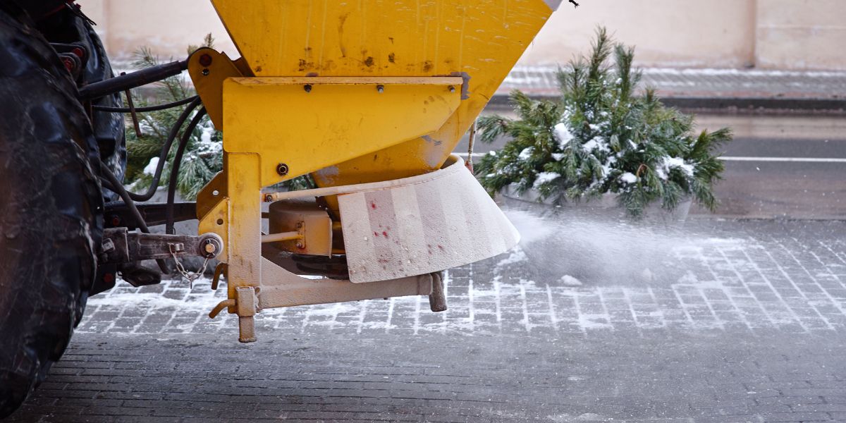 A truck spraying snow-melting salt across the road in Southeast Ohio.