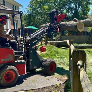 Lefke Tree Experts equipment operating on professional ground protection mats during Cincinnati tree removal, showing how proper lawn protection prevents property damage.